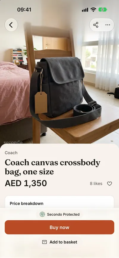 A listing with the protection badge above the buy button